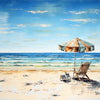Strandkorb und Sonnenschirm