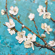 Zweig mit Blüten und Knospen
