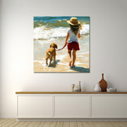 Mädchen mit Hund am Strand