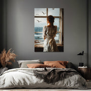 Frau im Kleid am Meer