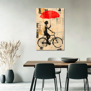 Mit dem Fahrrad mit Regenschirm